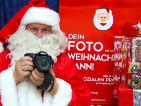 Auf dem Lichtermarkt: Machen Sie ein Foto mt de Weihnachtsmann!